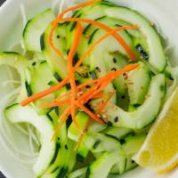 Cucumber Salad · Sliced cucumber with sweet vinegar. Vegan
