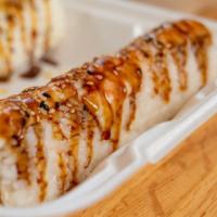 Jojo Roll · Shrimp tempura and crab salad wrapped with soy paper topped with cooked shrimp and teriyaki ...