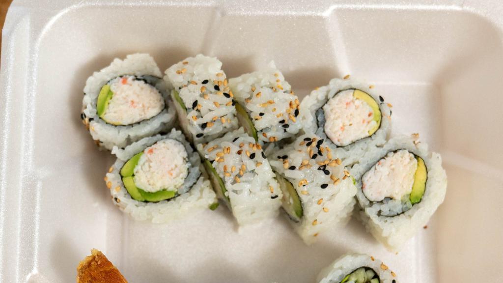 California Roll · Crab salad and avocado topped with sesame seeds.