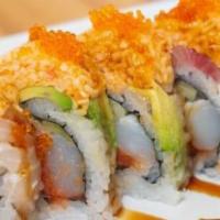 Kimono · Spicy tuna, scallops, cucumber, topped with yellow tail, avocado, and spicy crab salad with ...