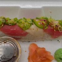 Koi · Ebi (cooked shrimp), spicy tuna, cucumber, topped with tuna, ono (escolar), sliced jalapeno,...