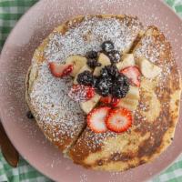 French Toast Pancakes · Three pieces pancakes battered and grilled like a fresh toast topped with maple strawberry, ...