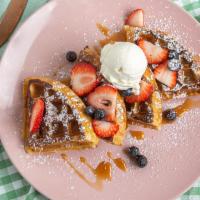 French Toast Waffle · A fluffy waffle battered and grilled like a fresh toast topped with maple, cream cheese and ...