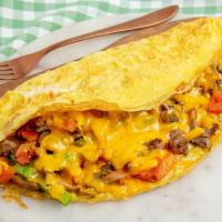 The Barnum · Omelette stuffed with steak, potatoes, green peppers, onions, mushrooms, tomatoes and Chedda...