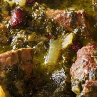 Ghormeh Sabzi Stew · A slow-cooked stew of sautéed fresh herbs, special seasonings, kidney beans, dried lime, and...