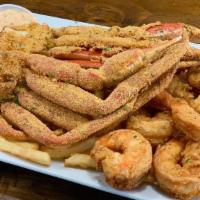 2 Fried Crab And Shrimp With Chips · 2 Succulent Fried Crab and golden fried Shrimp served on a bed of fries with buttered garlic...