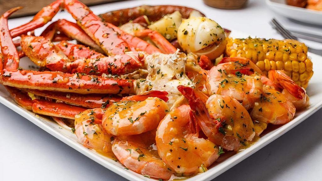 Snow Crabs And Shrimp(5-8 Oz) · 2 Snow Crabs, 10 Shrimp, 1 Corn, Egg, Sausage, & Potatoes. Large Portions! Plated for You to Enjoy!