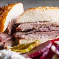 Brisket* · Kaiser Roll, pickles, beets, peanut coleslaw.

*Consuming raw or undercooked meats, poultry,...
