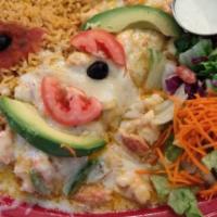 Mazatlán Enchilada · Large flour tortilla filled with shrimp and real crabmeat, cooked in a glazed lobster cream ...