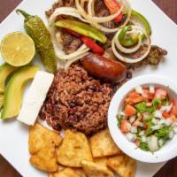 Carne Asada Con Chorizo · Comes with rice and beans.