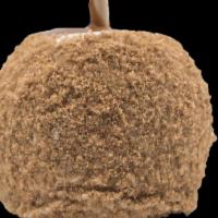 Dutch Apple Pie Caramel Apple · A Granny Smith Apple Covered In Freshly Made Caramel Then Dipped In White Confection And Rol...