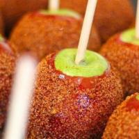 Chili Lemon Candy Apple · A Granny Smith Apple Covered In Cinnamon Flavored Candy.