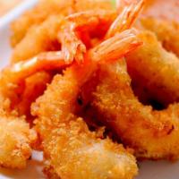 Fried Shrimp Bowl · Fresh caught large prawns, guacamole, pico de gallo, cabbage, Spanish rice, beans, and sour ...