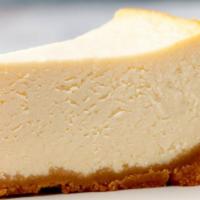 Cheesecake · Classic creamy cheesecake filling in a buttery graham cracker crust.