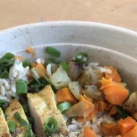 Trap Kitchen Curry Chicken · Jamaican style curry chicken, roasted yukon gold potatoes, roasted carrots, brown rice, baby...
