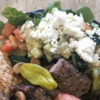 Greek Salad With Gyros · Mixed greens, tomatoes, feta cheese, cucumber, kalamata olives, red onions, pepperoncinis & ...