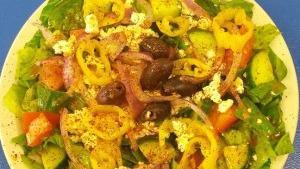 Greek Salad · Mixed greens, tomatoes, feta cheese, cucumber, kalamata olives, red onions, pepperoncinis & ...