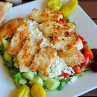 Greek Chicken Salad · Greek salad topped with eight ounces of chicken.