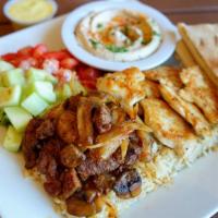 Meat Combo Plate · Served with salad, hummus, pita bread, and a choice of white rice, brown rice, or fries.