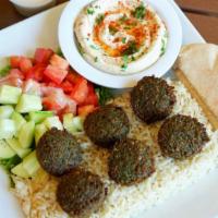 Falafel Plate · Vegetarian favorite. A mixture of garbanzo beans, vegetables, and spices cooked in canola oi...