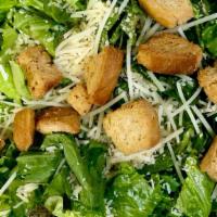 Caesar · Freshly chopped romaine lettuce in our homemade Caesar dressing topped with parmesan cheese ...