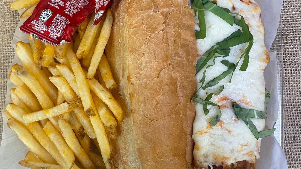 Chicken Parmesan Sandwich · Italian breaded chicken breast baked with mozzarella cheese and marinara in an Italian style bread roll served with French fries
