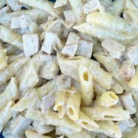 Chicken Alfredo · Penne pasta and chicken tossed in our creamy chardonnay alfredo sauce | served with garlic b...