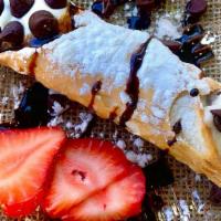Chocolate Chip Cannoli- · Housemade shell stuffed with chocolate chips, powdered sugar and chocolate syrup and sweeten...