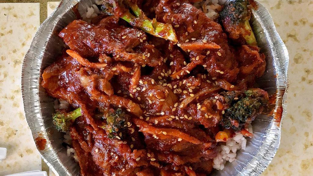 Pork Bulgogi · Spicy marinated pork with rice and salad