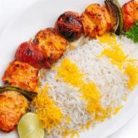 Chicken Shish Kabob · Thick strips of charbroiled chicken tenders marinated in our special sauce, served with bell...