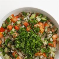 Shirazi Salad · Freshly diced tomatoes, cucumbers, and onions with lemon juice and parsley