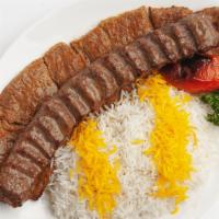 Soltani · One skewer of charbroiled filet mignon Barg and one skewer of juicy beef Koobideh, Served wi...