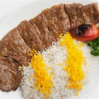 Filet Mignon Barg · Our finest cut of filet mignon thinly sliced and marinated, served with charbroiled tomato