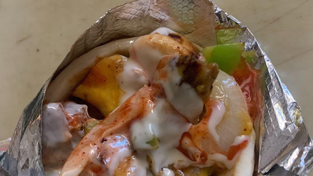 Chicken Philly · Chicken gyro, with grilled onions, bell peppers, cheese, topped with house ranch, spicy or non-spicy.