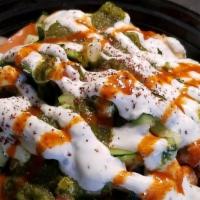 Chicken Bowl · All bowls are served with seasoned basmati rice, veggies, tzatziki and chutney sauces (serve...