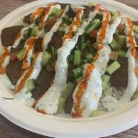 Lamb/Beef Bowl · All bowls are served with seasoned basmati rice, veggies, tzatziki and chutney sauces (serve...
