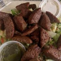 Lamb/Beef Mixed Salad · Salad is served with grilled chicken on the top of lettuce, veggie mix and tzatziki and chut...