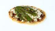 Huarache Azteca · beans, hot salsa, queso fresco, onions and cilantro + grilled cactus