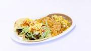 Taco Plate · Two Tacos The Works tacos (choice of meat), lettuce, tomato, sour cream, cheese, rice and be...