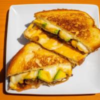 Fancy Grilled Cheese · You'll be eating this sandwich with your pinkies UP. Melted cheddar and mozzarella cheese wi...