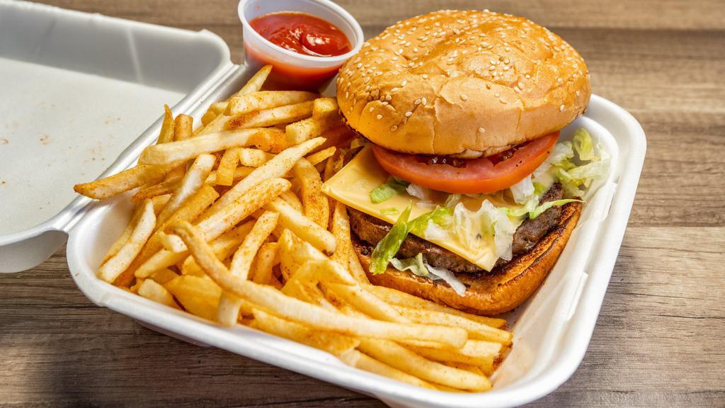 Cheeseburger Combo (Specialty) · beef patty, American cheese,  tomate, burger bun, onions, lettuce, thousand island dressing/ French fries season with beef seasoned