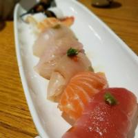 Nigiri Sushi Mix Lunch · 7 pieces assorted sushi mix. Tuna, salmon, albacore, yellowtail, snapper octopus, and shrimp.