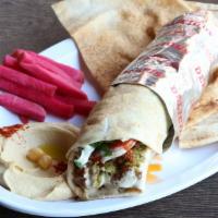 Falafel Wrap · Falafel, tomatoes, pickles, tahini sauce.
Plus pickles and a side of your choice.