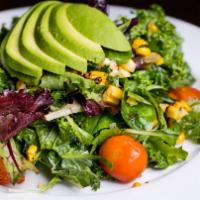 Gardner Salad · Mixed organic baby greens &  kale, roasted corn, roasted cherry tomatoes & avocado with jala...