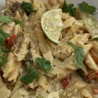 Tequila Lime Penne · Penne pasta tossed in white tequila lime  sauce with serrano peppers and bell peppers