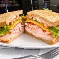 Club Sandwich · Turkey, ham and bacon with mayo, lettuce, tomato, and your choice of cheese on your choice o...