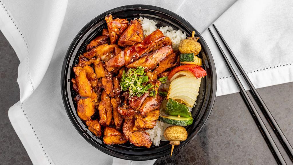 Spicy Chicken Teriyaki Bowl · Spicy. Grilled Chicken with spicy teriyaki sauce. Served on steamed white rice with a veggie skewer.