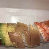 Rainbow Roll · California roll topped with fresh assorted fish.