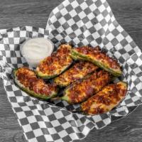 Jalapeño Poppers 6Pc · 6 baked jalapenos boats stuffed with cream cheese, mix cheese & bacon.