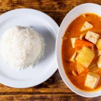 Massaman Curry /W Rice · Popular curry from the South of Thailand cooked with choice of meat, potato, carrot, peanuts...